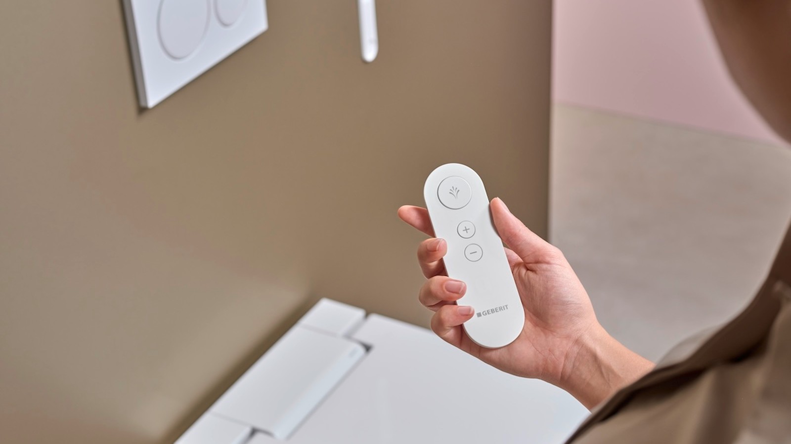 Særlig fjernbetjening til styring af douchetoilettet Særlig fjernbetjening til styring af douchetoilettet