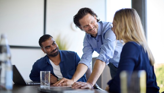 Employees on a job interview on a table Employees on a job interview on a table