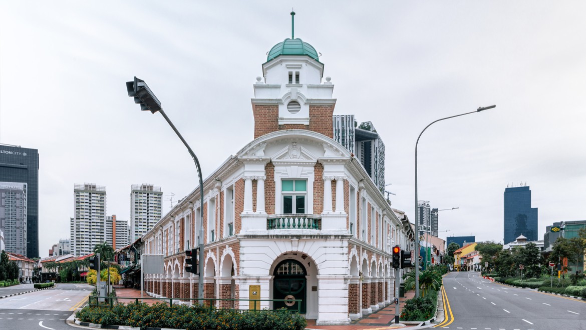 Born Restaurant ligger i Jinrikisha Station, en af ​​de få historiske bygninger i Singapore (© Owen Raggett)